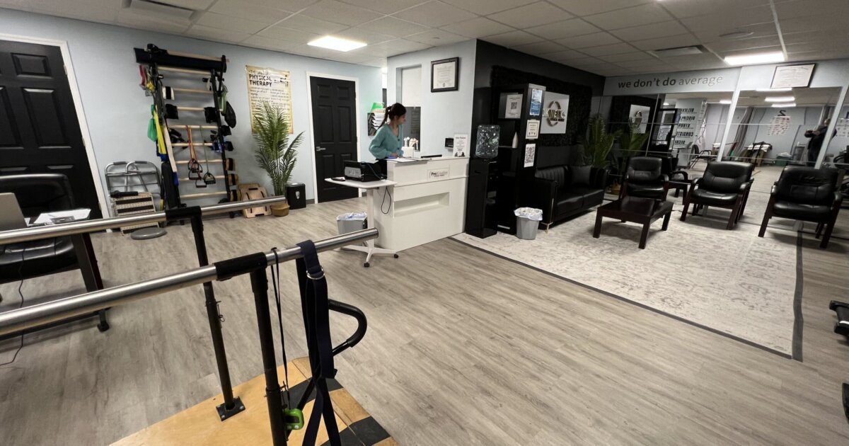 Parallel bars and open treatment space at ProKinetics Physical Therapy